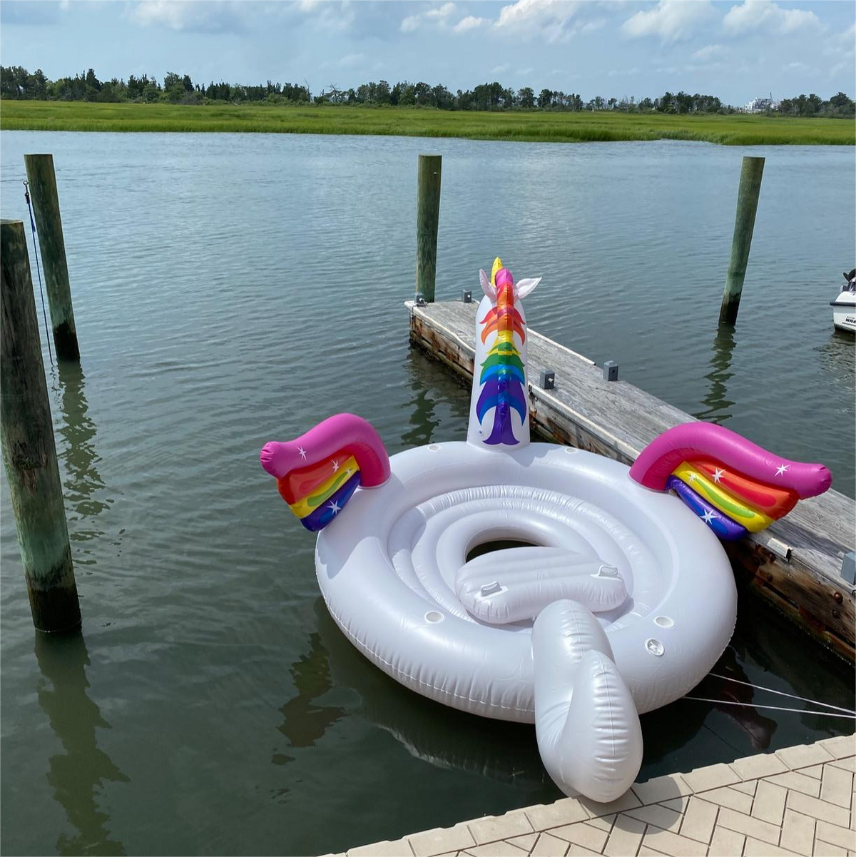 Jumbo unicorn party float with a cup holder built into every seat