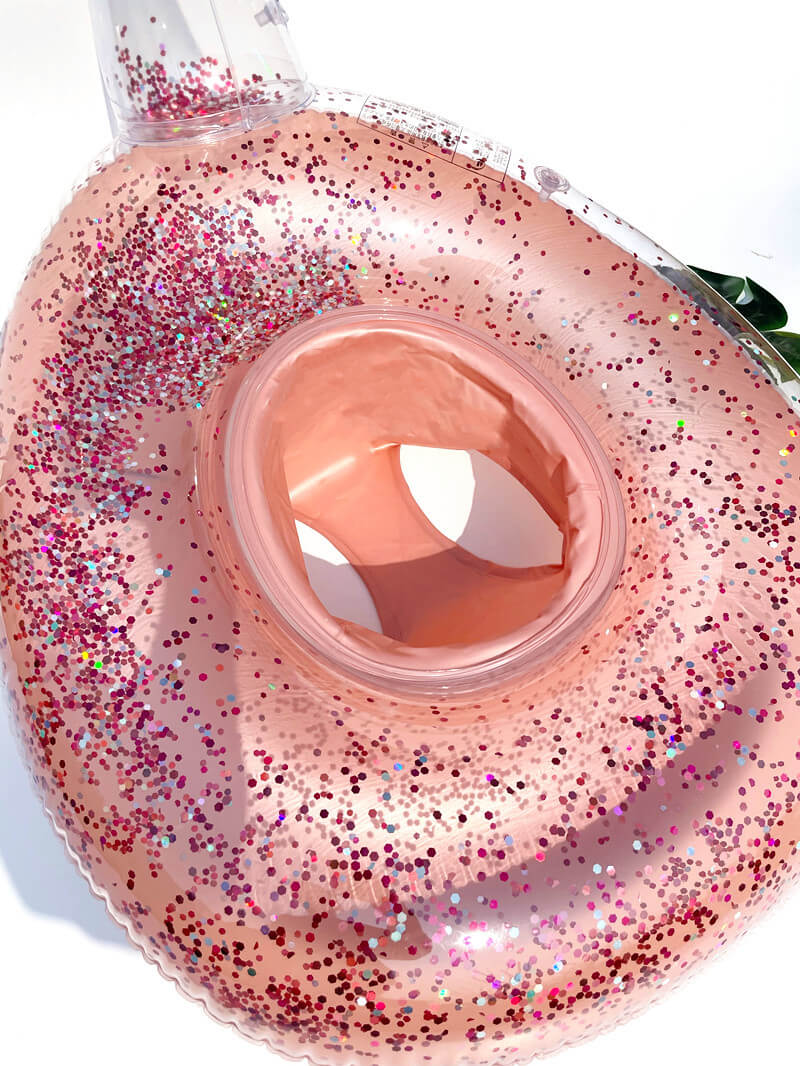 Glittery-swimming-pool-tube-pink-mermaid-starwake  800 × 1066 px